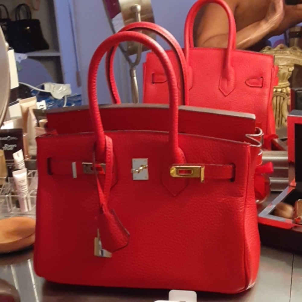 Red birkin like style bag.